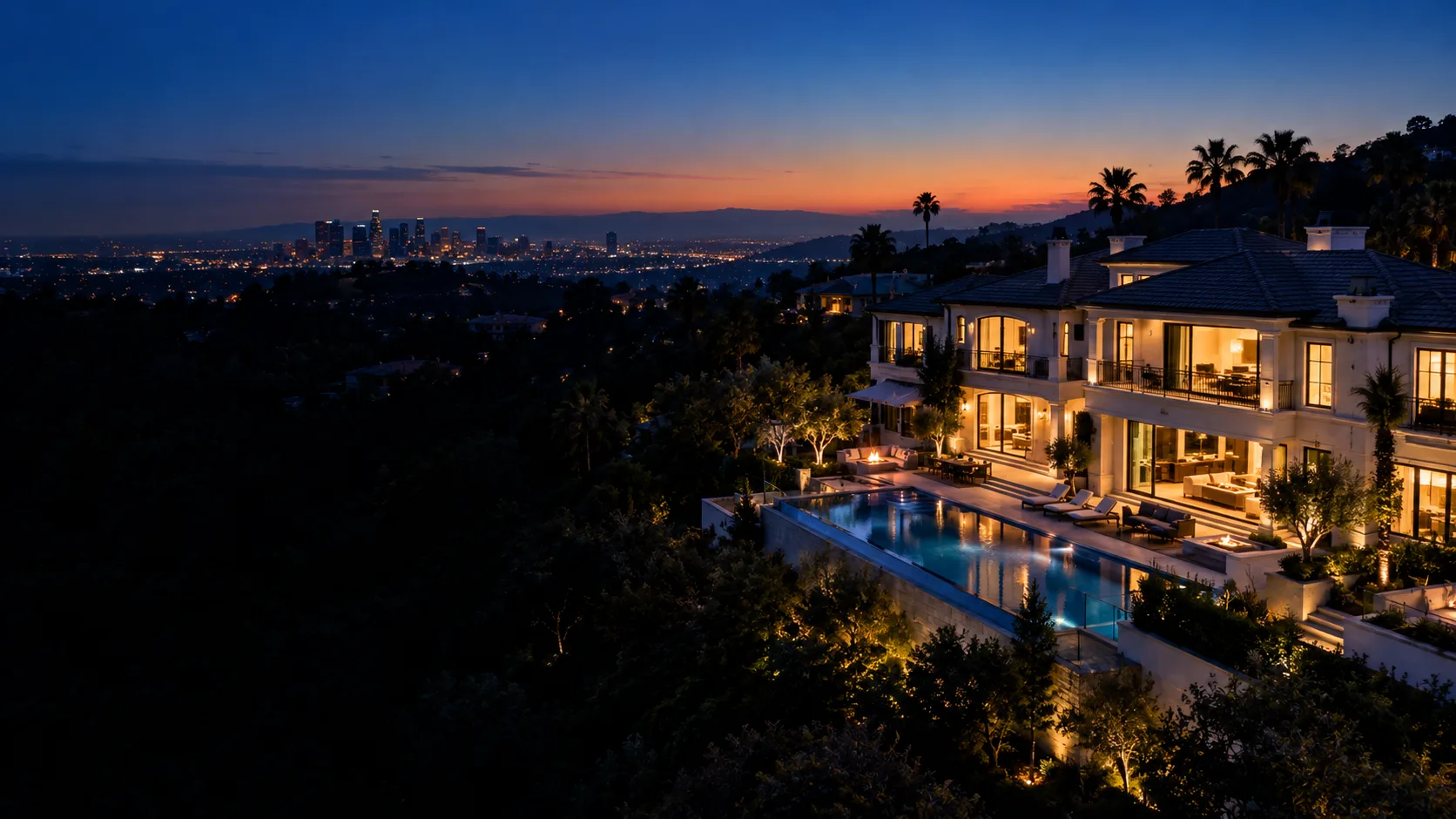 Large home with a pool at dusk